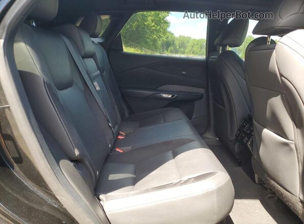 2T2BCMEA6RC015982 2024 LEXUS RX Black Vista interior trasera