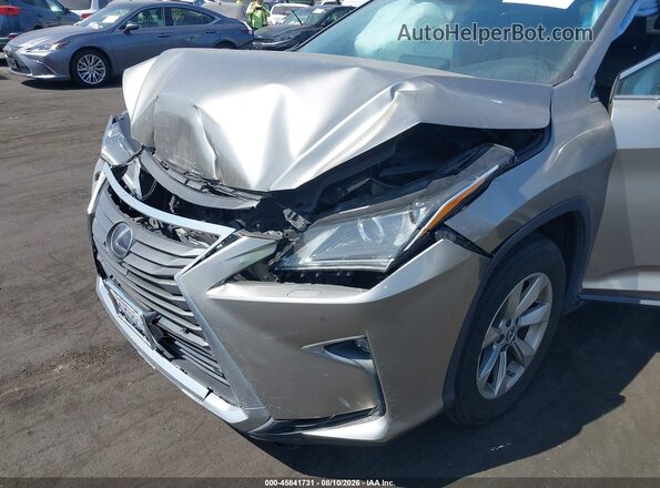 2T2BGMCA0KC032502 2019 LEXUS RX 450H Champagne Սարքավորումների վահանակի տեսք