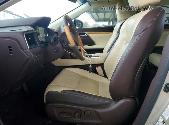 2T2BGMCA3HC012107 2017 LEXUS RX Золотой Вид салона спереди