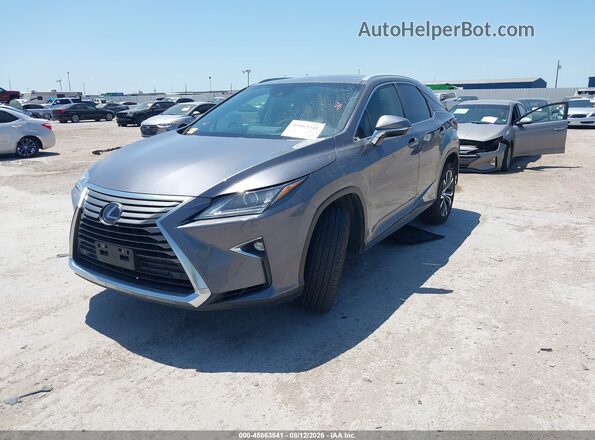 2T2BGMCA3KC042666 2019 LEXUS RX 450H Gray Vista tres cuartos delantera izquierda