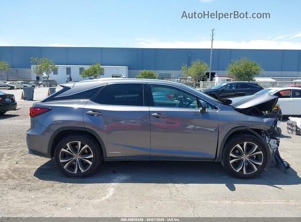 2T2BGMCA5GC006002 2016 LEXUS RX 450H Gray 360 interior view