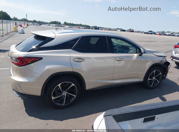 2T2BGMCA6HC014501 2017 LEXUS RX 450H Beige Widok wnętrza z tyłu