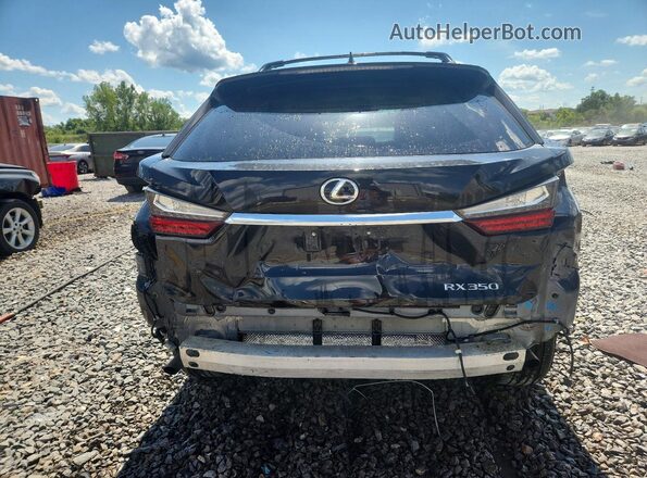 2T2BZMCA1HC064684 2017 LEXUS RX Black Rear view