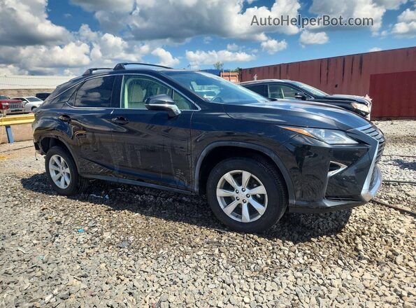 2T2BZMCA1HC064684 2017 LEXUS RX Black Front right
