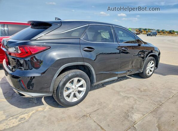 2T2BZMCA1HC069867 2017 LEXUS RX Black Rear right
