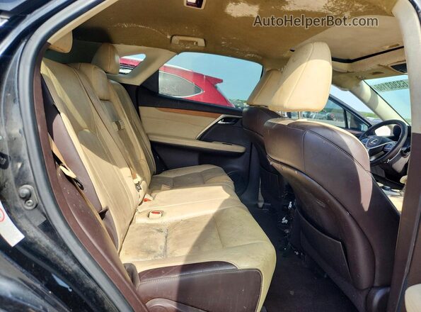 2T2BZMCA1HC069867 2017 LEXUS RX Black Rear interior view