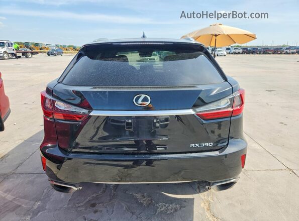 2T2BZMCA1HC069867 2017 LEXUS RX Black Rear view