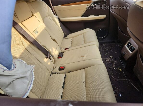2T2BZMCA1JC163138 2018 LEXUS RX Red Vista de los asientos traseros