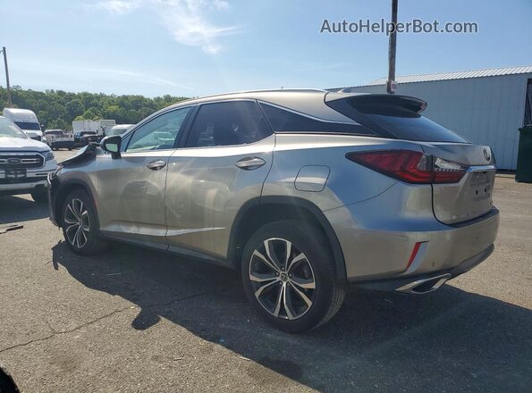 2T2BZMCA1KC202635 2019 LEXUS RX Silver Trasero izquierdo