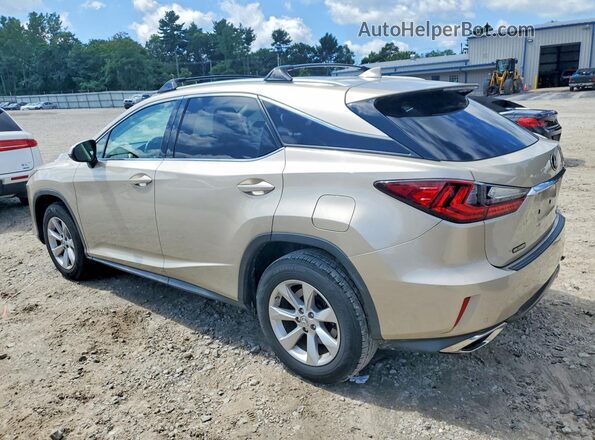 2T2BZMCA2GC025469 2016 LEXUS RX Beige Trasero izquierdo