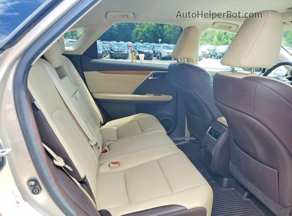 2T2BZMCA2GC025469 2016 LEXUS RX Beige Vista interior trasera