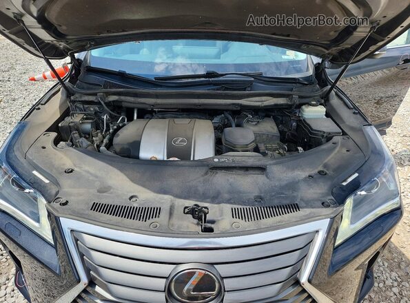 2T2BZMCA2JC141326 2018 LEXUS RX Black Rear interior view