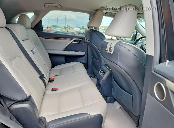 2T2BZMCA2JC141326 2018 LEXUS RX Black Rear seats view