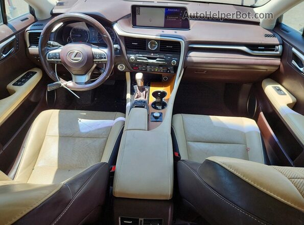 2T2BZMCA2KC209898 2019 LEXUS RX Beige Dashboard view