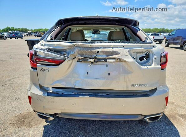 2T2BZMCA2KC209898 2019 LEXUS RX Beige Rear view