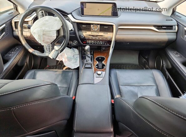 2T2BZMCA3KC192111 2019 LEXUS RX Серый Вид панели приборов