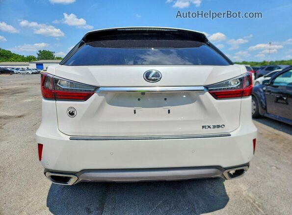 2T2BZMCA5HC057432 2017 LEXUS RX White Вид ззаду