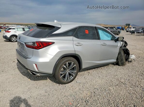 2T2BZMCA6HC133854 2017 LEXUS RX Silver Trasero derecho