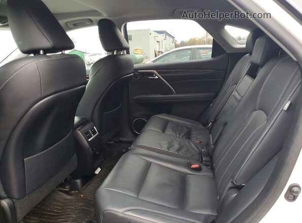2T2BZMCA6JC159523 2018 LEXUS RX White Vista interior trasera
