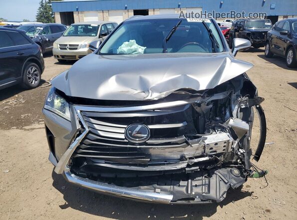 2T2BZMCA6KC209449 2019 LEXUS RX Silver Widok z przodu