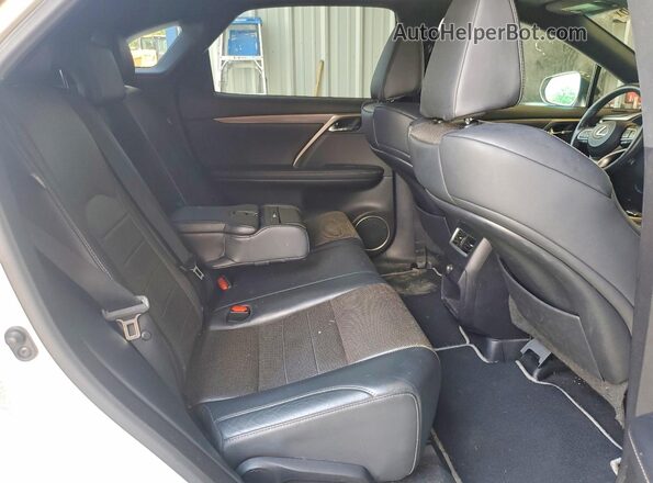2T2BZMCA7GC017402 2016 LEXUS RX White Vista interior trasera