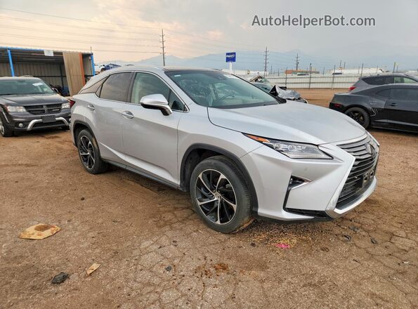 2T2BZMCA7GC024639 2016 LEXUS RX Silver Передня права чверть