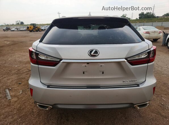 2T2BZMCA7GC024639 2016 LEXUS RX Silver Вид ззаду