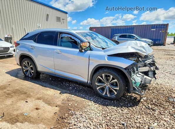 2T2BZMCA7KC192015 2019 LEXUS RX Серебряный Передняя правая четверть