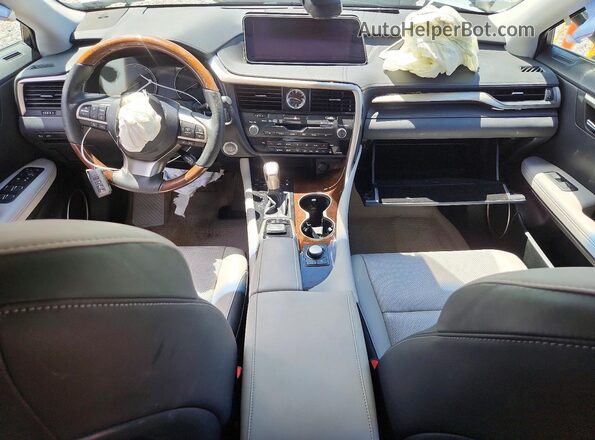 2T2BZMCA7KC192015 2019 LEXUS RX Серебряный Вид панели приборов