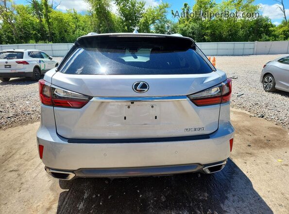 2T2BZMCA7KC192015 2019 LEXUS RX Серебряный Вид сзади