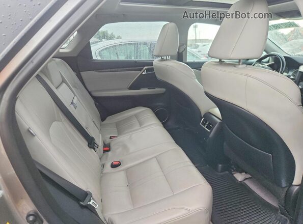 2T2BZMCA8KC168872 2019 LEXUS RX Beige Rear interior view