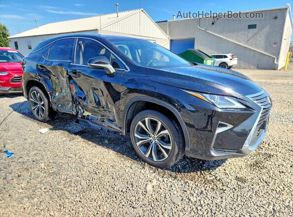 2T2BZMCA9JC152646 2018 LEXUS RX Черный Передняя правая четверть