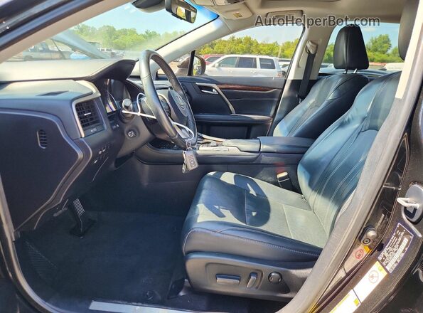 2T2BZMCA9JC152646 2018 LEXUS RX Черный Вид салона спереди