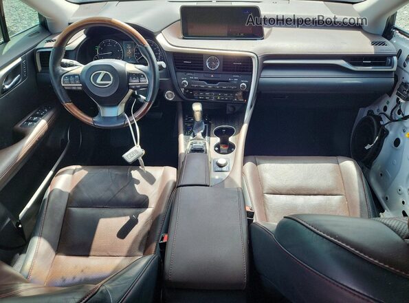 2T2BZMCAXGC031438 2016 LEXUS RX Белый Вид панели приборов