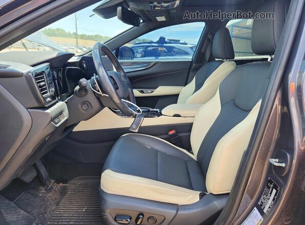 2T2GGCEZ4PC021965 2023 LEXUS NX Gray Vista interior delantera