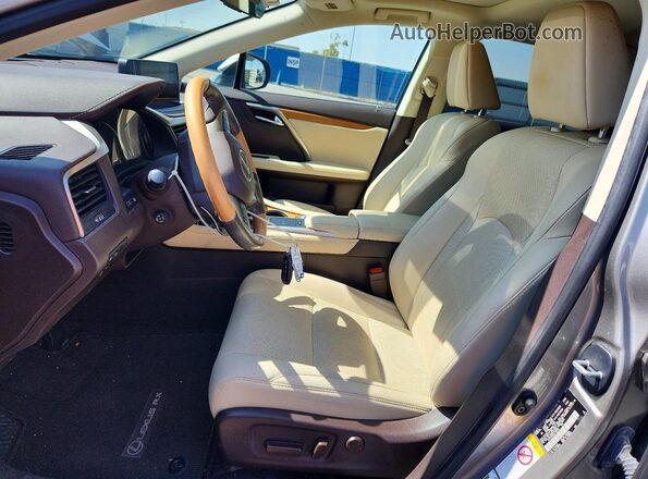 2T2HZMAA8LC155506 2020 LEXUS RX Серебряный Вид салона спереди