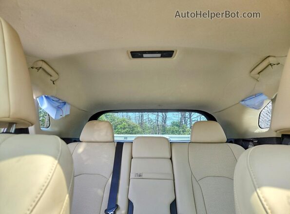 2T2HZMDA9NC357902 2022 LEXUS RX Tan Vista de los asientos traseros