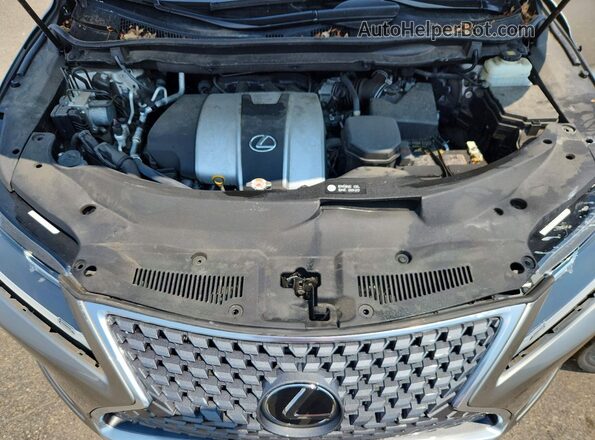 2T2HZMDA9NC357902 2022 LEXUS RX Tan Vista del compartimento del motor