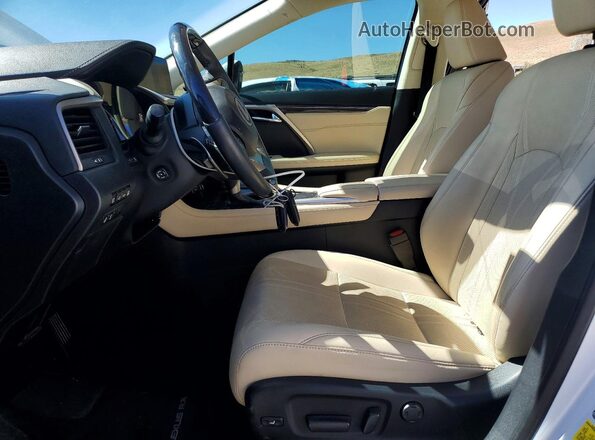 2T2JGMDA0MC068218 2021 LEXUS RX Белый Вид салона спереди