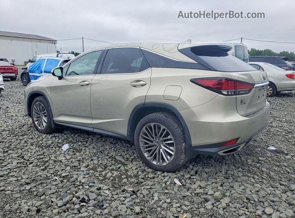 2T2JZMDAXMC261180 2021 LEXUS RX Tan Trasero izquierdo