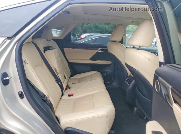 2T2JZMDAXMC261180 2021 LEXUS RX Tan Vista interior trasera