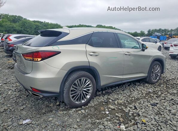 2T2JZMDAXMC261180 2021 LEXUS RX Tan Trasero derecho