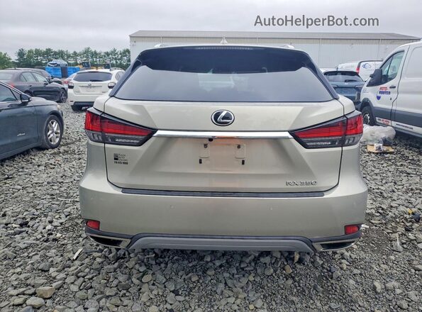 2T2JZMDAXMC261180 2021 LEXUS RX Tan Vista trasera