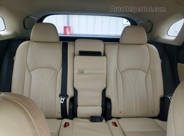 2T2JZMDAXMC261180 2021 LEXUS RX Tan Vista de los asientos traseros