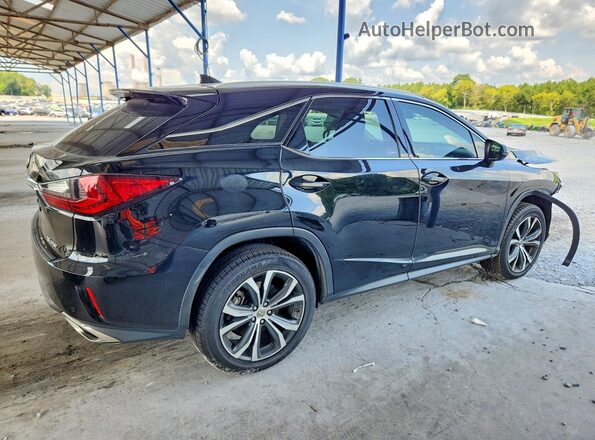 2T2ZZMCA1HC048693 2017 LEXUS RX Black Rear right
