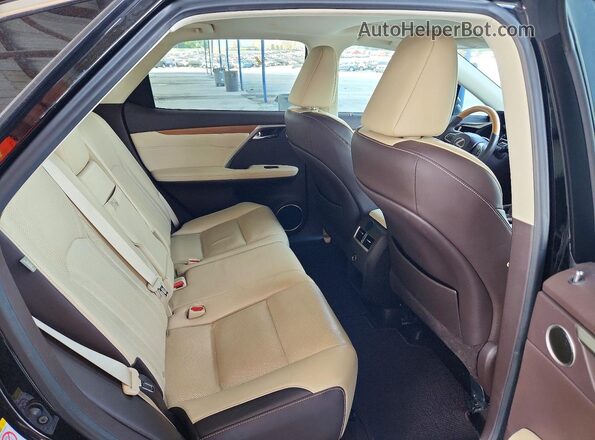 2T2ZZMCA1HC048693 2017 LEXUS RX Black Rear seats view