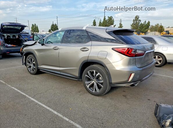 2T2ZZMCA2HC064692 2017 LEXUS RX Silver Trasero izquierdo