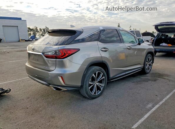 2T2ZZMCA2HC064692 2017 LEXUS RX Silver Trasero derecho