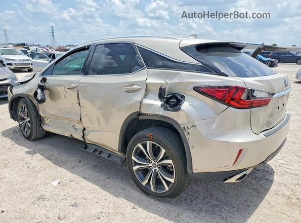 2T2ZZMCA2KC143741 2019 LEXUS RX Gold Tył lewy