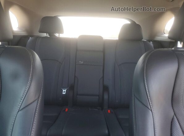 2T2ZZMCA2KC146400 2019 LEXUS RX Silver Rear seats view
